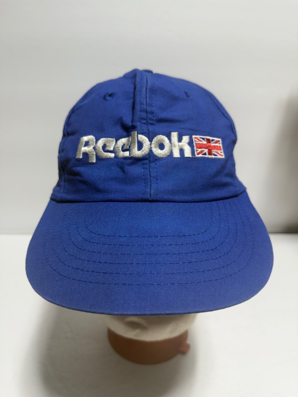 Vintage Reebok Royal Blue Embroidered Logo Cap with Flag Patch